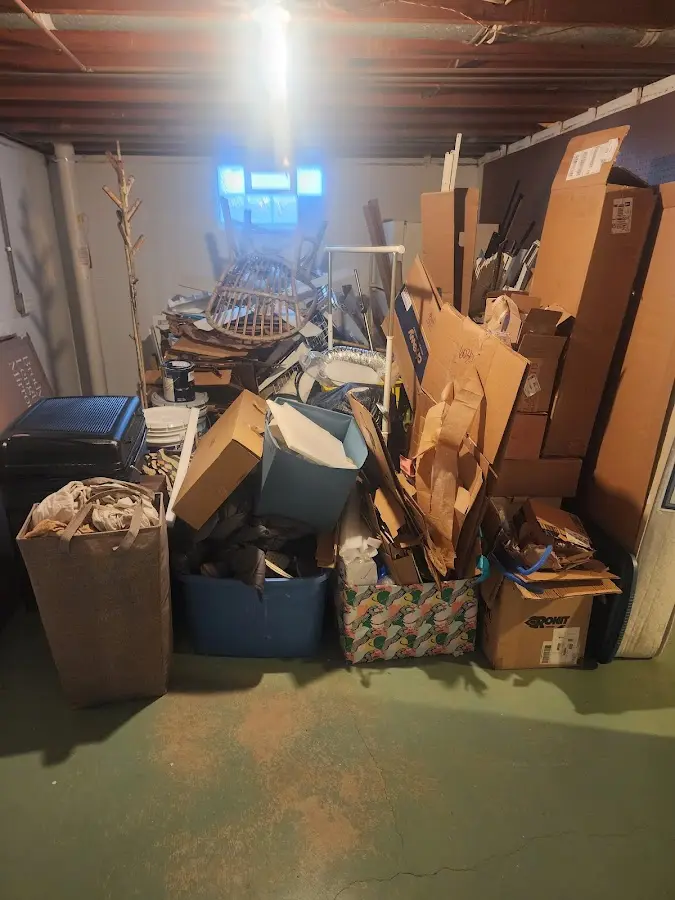 Roll-off dumpster container at job site for 2 Yard Dumpster Rental in Mayville